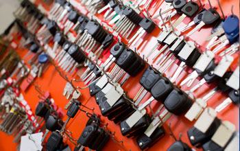 lots of car keys on a wall rack ready to be sold